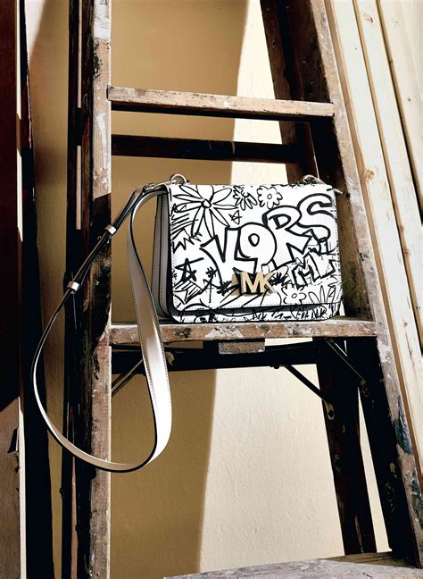 Michael Kors reveals graffiti